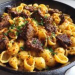 cajun steak bites and cheesy garlic shells skillet