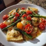 ravioli with tomatoes asparagus garlic and herbs