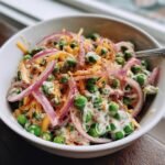 pea salad with red onions and cheese is delicious