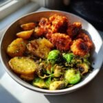 buffalo bites bowl with crispy potatoes shaved brussels